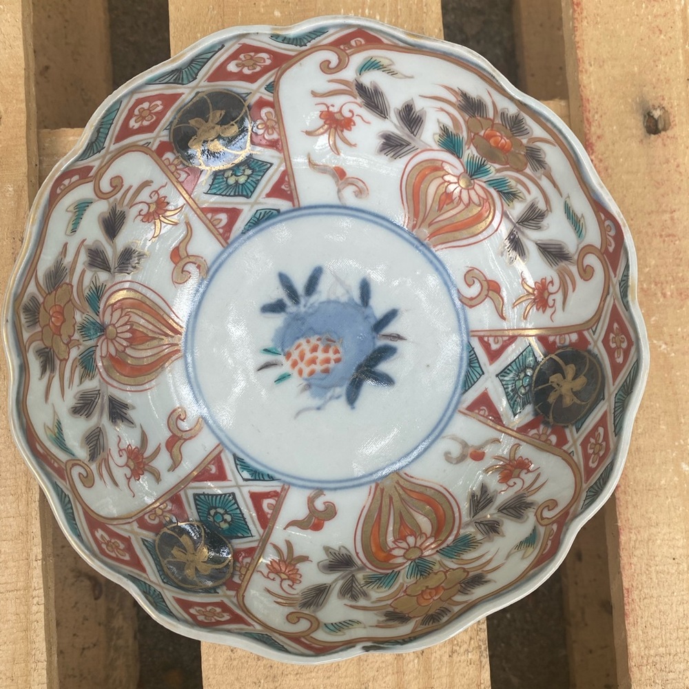 Imari antique dish made in Japan. Catch all dish with a pomegranate design.